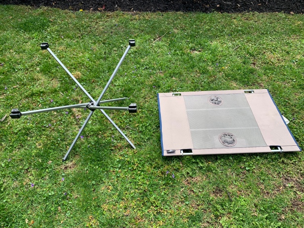Ozark Trail Folding Camping Table Base and Top Laid out to show them separately
