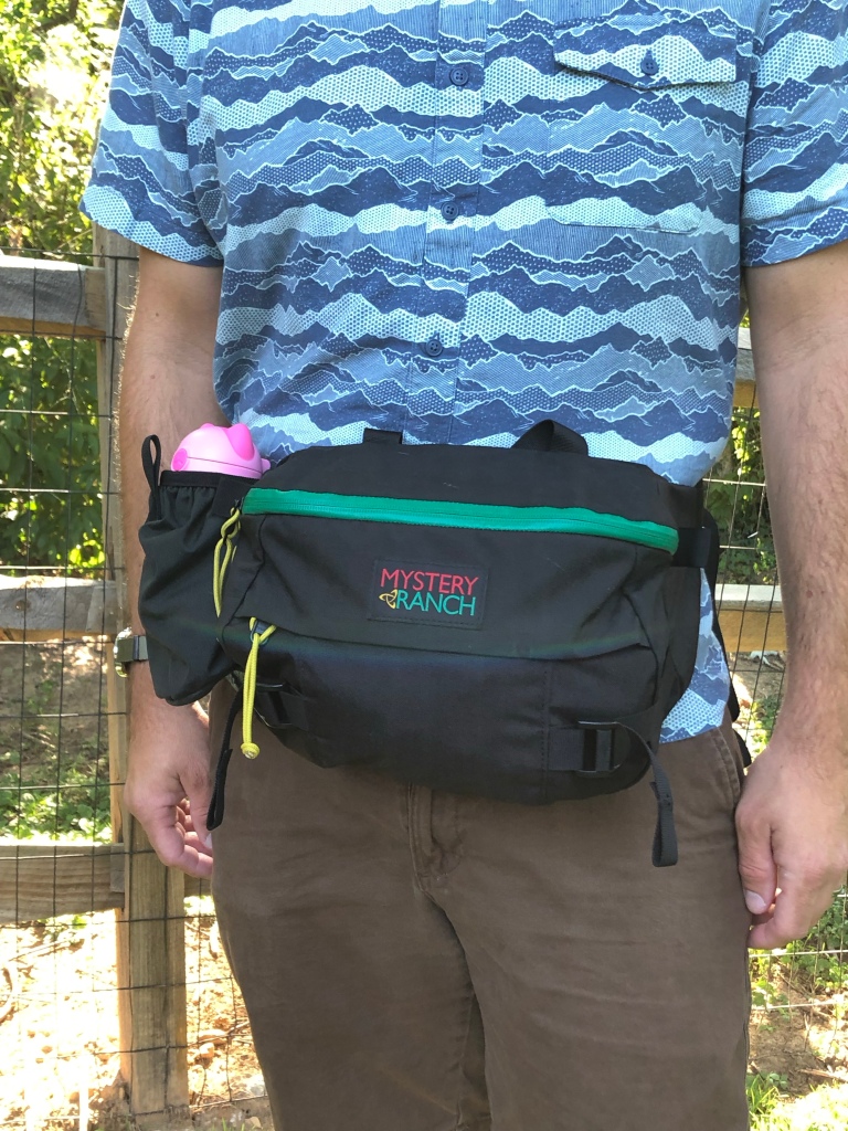 The Mystery Ranch Hip Monkey pack worn as a waist pack / fanny pack