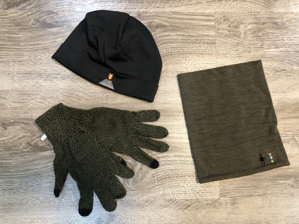Merino wool winter accessories, including a hat, gloves, and a neck gaiter